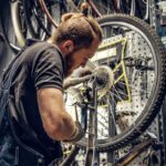 Mechanic Removing Bicycle Rear